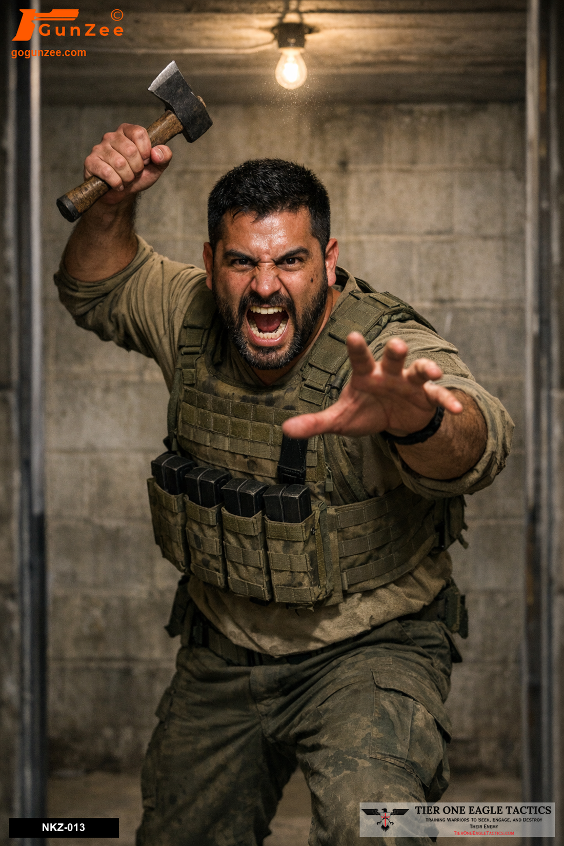 Aggressive male with a hatchet raised overhead in a concrete interior, wearing tactical gear.