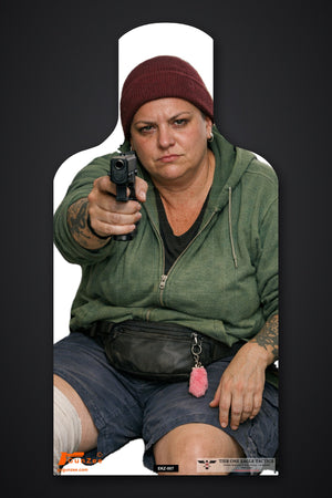 Life-size E-type silhouette target: seated woman in a maroon beanie and green hoodie with a bandaged knee, pointing a pistol with one hand