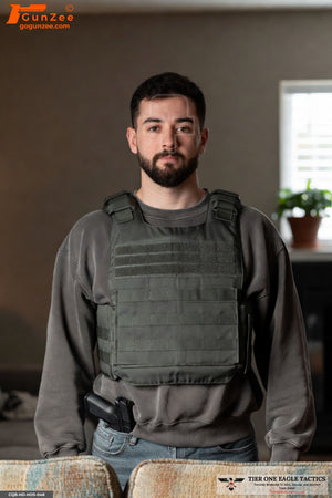 Interior Male Wearing Body Armor With Concealed Handgun Shooting Target