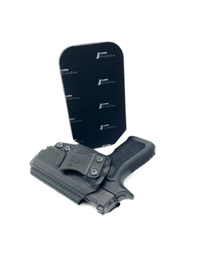 A black memory foam cushion designed for use with compact firearms holsters, shown alongside a gun holster.