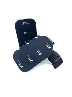 Three pieces of black memory foam cushioning designed to be placed between a holster and the wearer's waistband for comfort.
