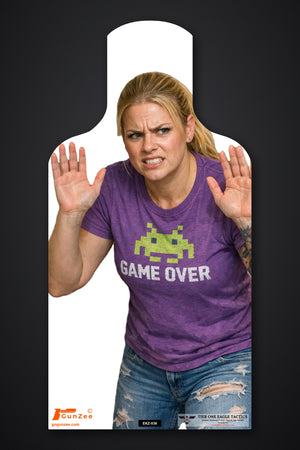 Life-size E-type silhouette no-shoot target: blonde woman in a purple GAME OVER t-shirt with both hands raised