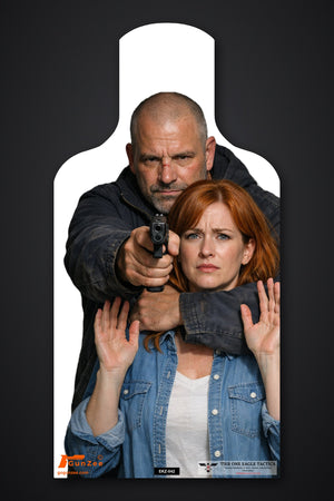Life-size E-type silhouette hostage target: bald man in a dark jacket aiming a pistol at the viewer beside a red-haired woman with her hands raised